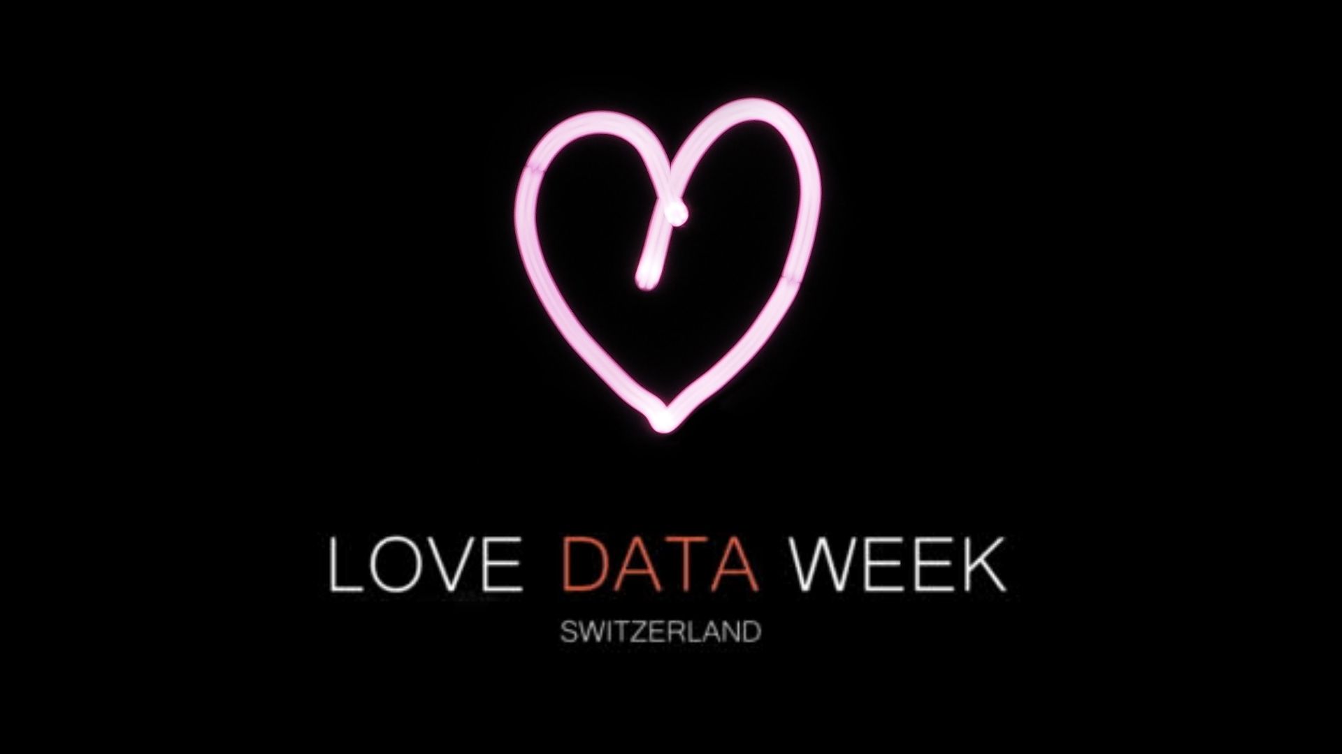 Love Data Week Key Visual mit rosa Herz auf schwarzem Hintergrund